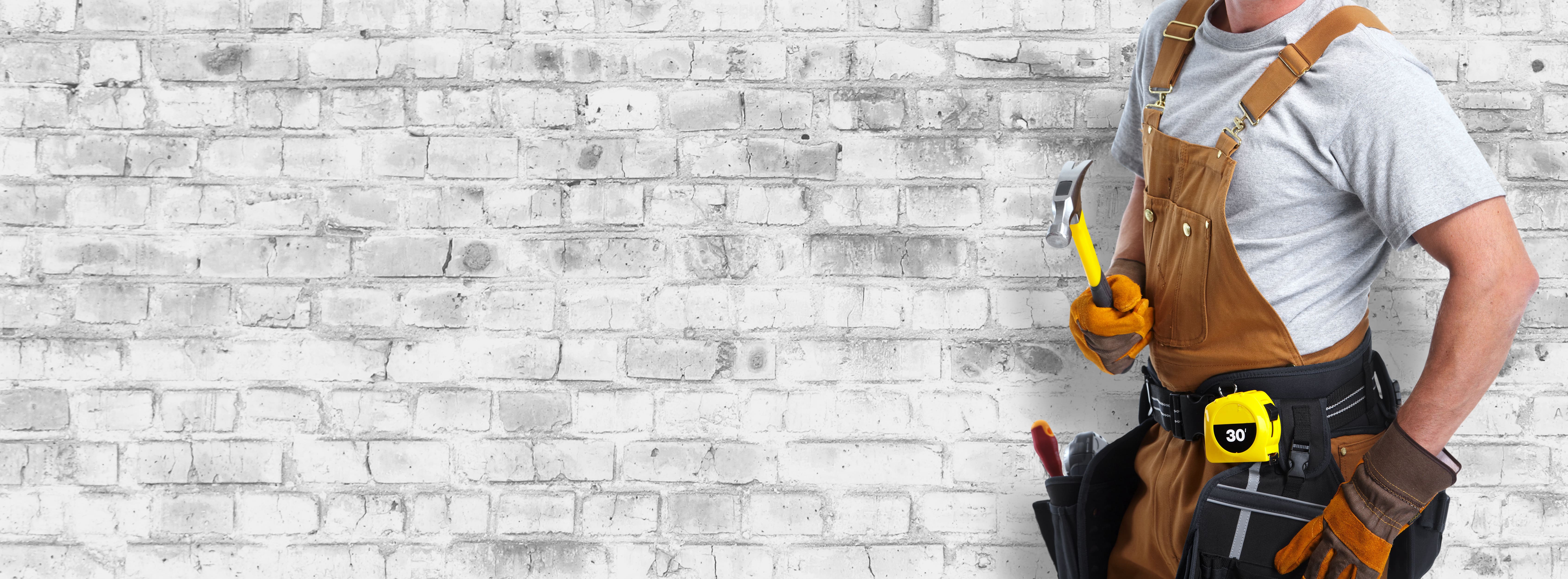 Handyman with grey wall